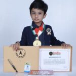 K. Adithya Tarunishwar, LKG of VKids, T.S Krishna Nagar has secured his name in the India Book of Records 2021 held recently in Chennai. He identified 7 ancient coins,12 dinosaurus, 50 animals, 13 vegetables, 12 fruits, 20 colours,11 shapes, 10 community helpers, 24 objects, reciting 16 Thirukkurals, Days of the week, English alphabets with words,10 good habits, 30 opposite words, 4 rhymes, 29 GK questions,13 National symbols and 9 rivers at the age of 3 years 7 months. He sets the record and gets honoured for his extraordinary memory power.