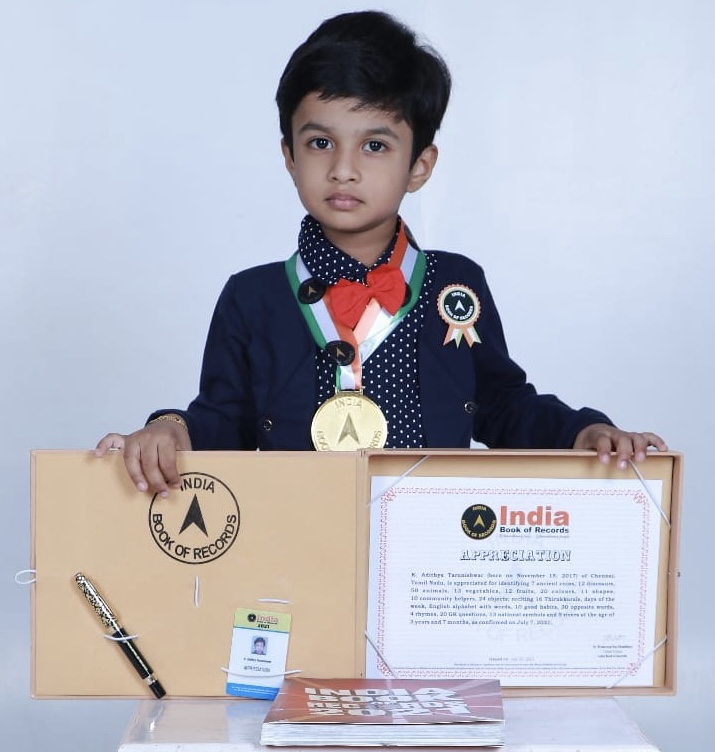 K. Adithya Tarunishwar, LKG of VKids, T.S Krishna Nagar has secured his name in the India Book of Records 2021 held recently in Chennai. He identified 7 ancient coins,12 dinosaurus, 50 animals, 13 vegetables, 12 fruits, 20 colours,11 shapes, 10 community helpers, 24 objects, reciting 16 Thirukkurals, Days of the week, English alphabets with words,10 good habits, 30 opposite words, 4 rhymes, 29 GK questions,13 National symbols and 9 rivers at the age of 3 years 7 months. He sets the record and gets honoured for his extraordinary memory power.